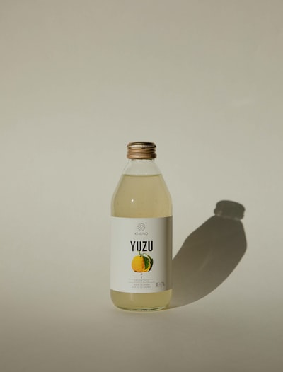 white and yellow labeled bottle